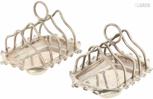 (2) Silver toast racks.