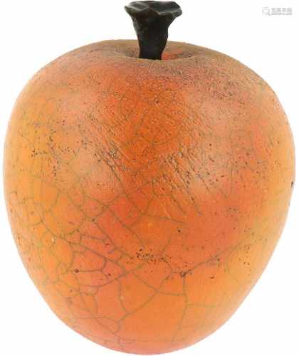 A decorative stilized stone apple.