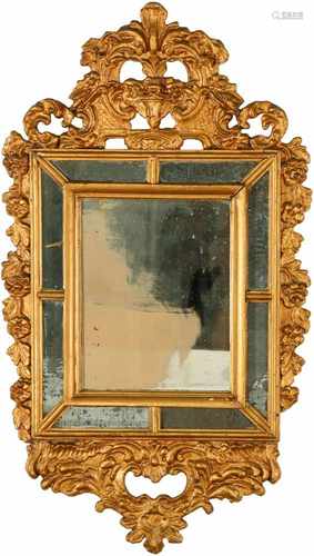 An early 18th century French Louis XIV latin copper wall mirror.