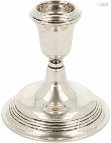 Silver candlestick.