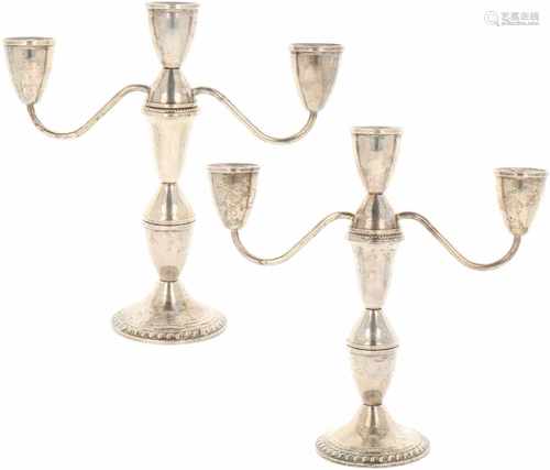 (2) Silver candlesticks.