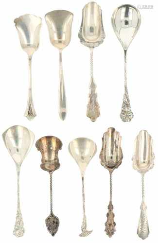 (9) Pieces of silver sugar scoops.