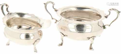 (2) Piece silver set of creamers.