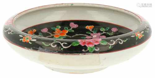 A porcelain charger with floral décor. Japan, 20th century. 