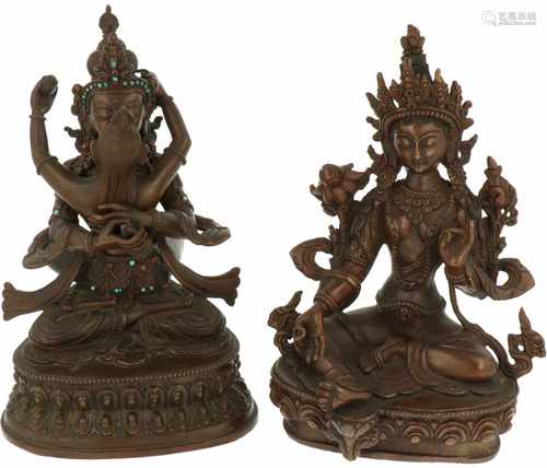 A lot with (2) bronze Buddha's, following antique examples.