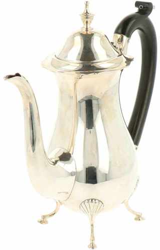 Silver coffee pot.