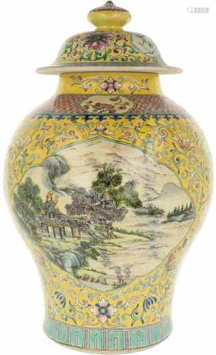 An earthenware lidded vase decorated with flowers. China, mid 20th century.