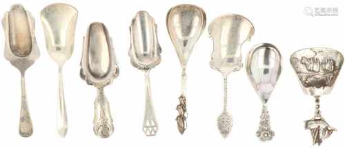 (8) Pieces of silver sugar scoops.