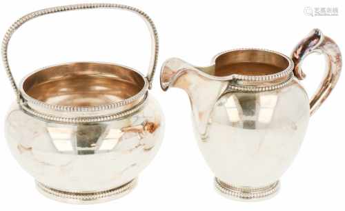 (2) Piece silver set of creamers.