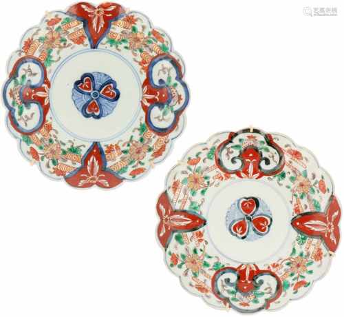 A set of porcelain plates with Imari décor. Japan, 1st half 20th century. 