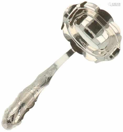 Silver ladle.