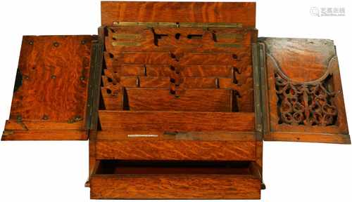 An oak 'Stationery Cabinet', Partridge & Cooper, 192 Fleet Street London. With secret compartment.