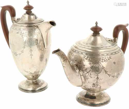 Silver tea and coffee pot.