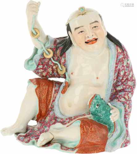 A porcelain Famille Rose statuette, seal mark. China, Republic period.