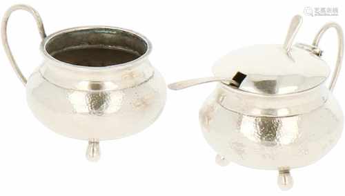 Silver mustard pot and salt celarette.