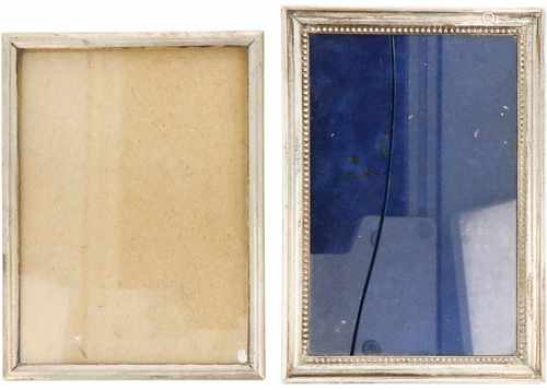 (2) Silver picture frames.