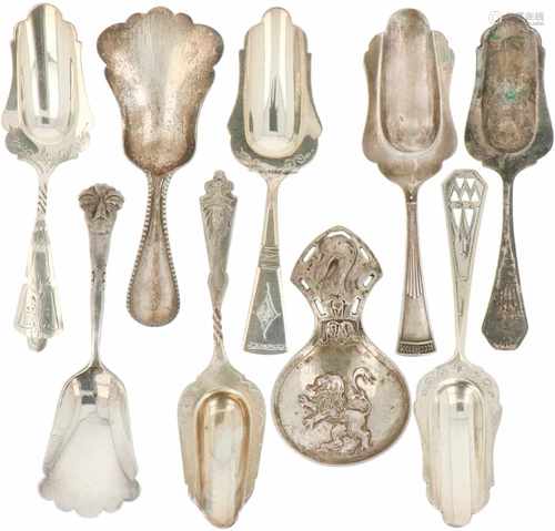 (9) Pieces of silver tea scoops.