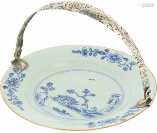 A porcelain plate with landscape décor and silver mount. China, Qianglong. 