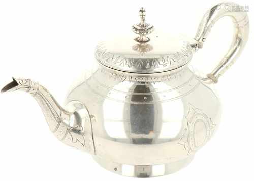 Silver teapot.