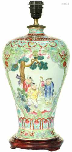 A porcelain lamp base decorated with Famille Rose décor. China, 20th century. 