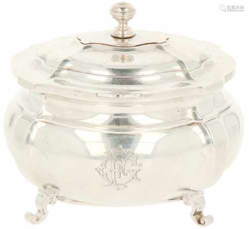 Silver tea caddy.