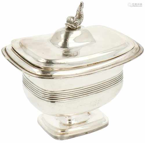 Silver tea caddy.