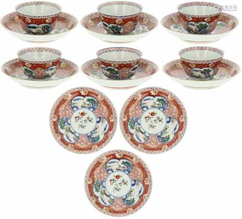 A lot with (6+9) cups and saucers with Imari décor. Japan, 19th century. 