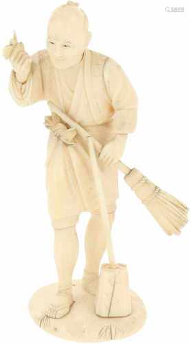 An ivory statuette in the shape of a street sweeper. Japan, late Meiji period.