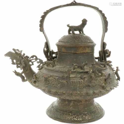 A bronze kettle, decorated with dragons and mythological creatures. Brunei, possibly 18th/ 19th