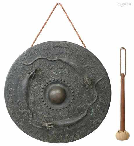 A bronze gong with figures. Brunei, 20th century.