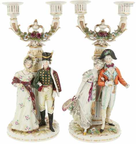 A set procelain candles with depiction of a lady and a gentleman.Volkstedt-Rudolstadt, Germany.