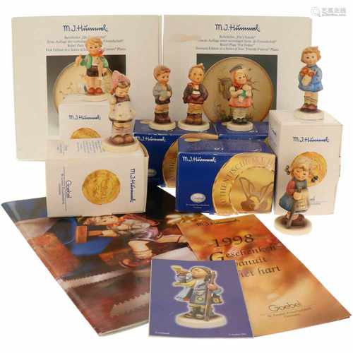 A lot with (7) Hummel statuettes in original box. Together with 2 relief plates in original box. All