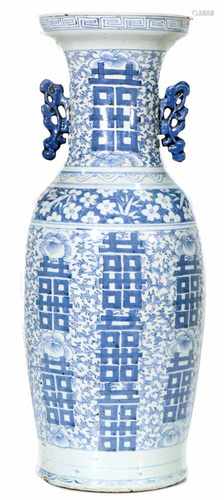 A porcelain baluster vase decorated with Chinese characters. China, ca. 1900.