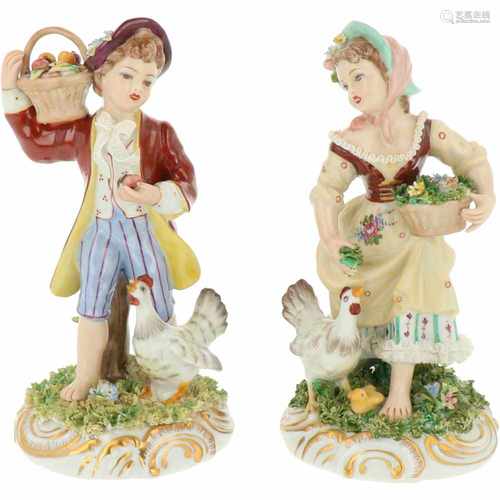 A set of porcelain figurines with farmers boy and - girl. Volkstedt-Rudolstadt, Germany. Mid 20th