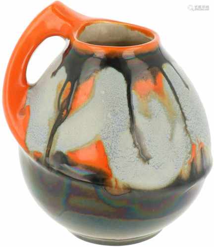 A flow glaze earthenware jug. Velsen, ca. 1930.