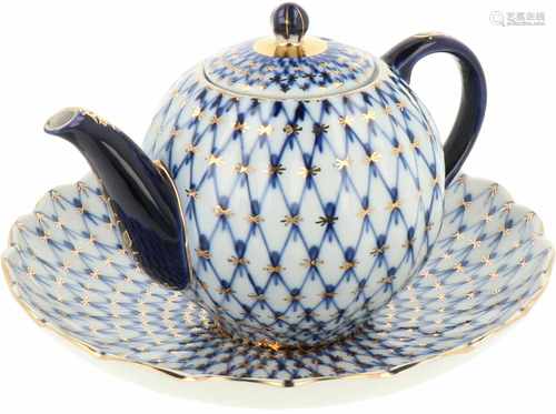 A porcelain teapot with saucer, Lomonosov Imperial Porcelain Factory. Russia, 2nd half 20th century.