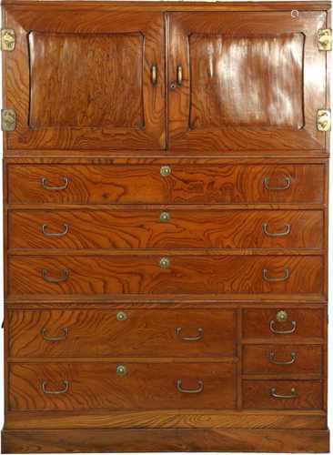 A mahogany chest of drawers with brass mounts. China, Second half 20th century.