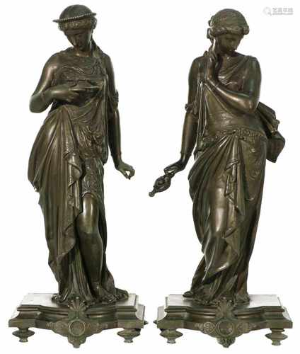 A set ZAMAC-statues of two Vestal Virgians, late 19th century. One with oil lamp and one with