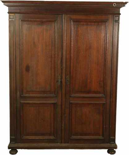 A large oakwood wardrobe with two doors. Ca. 1900/1920.