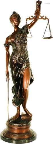 A brown patinated bronze statue of an allegorical figure presenting Justice. Second half 20th