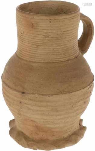 An earthenware miniature jug. Possibly 2nd half 17th century.