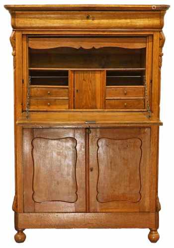 An oak secretaire with two doors and a drawer. Dutch, 19th century.