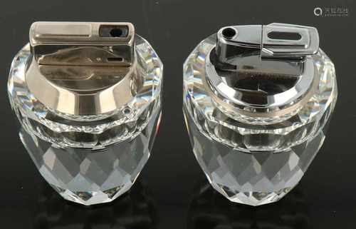 Two Swarovski table lighters. 20th century.