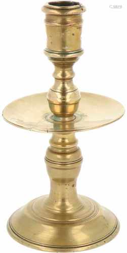 A bronze candle with a disc drip pan. Ca. 1700.