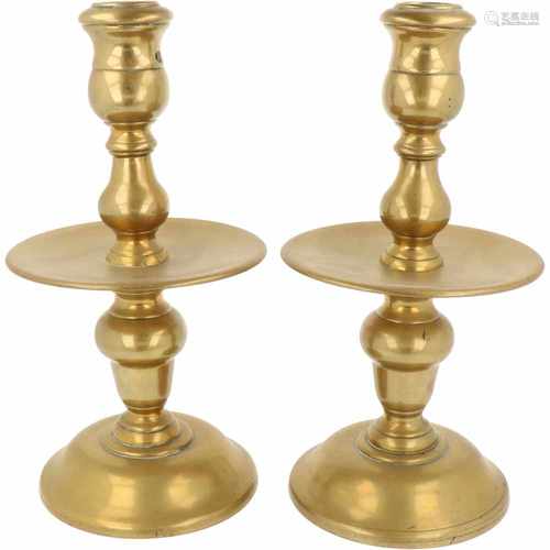 A set with (2) disc candles. Ca. 1800.