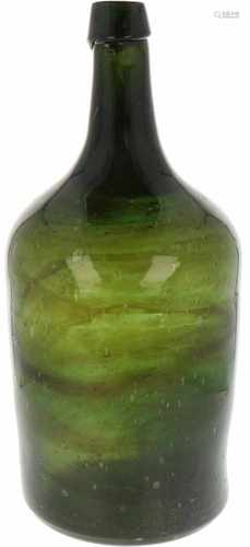 A green glass bottle. 19th century.