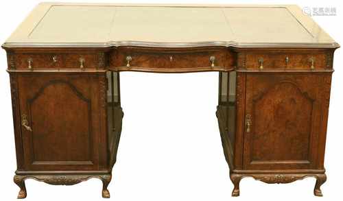 A Queen Ann-style nutwood veneered partnerdesk with leather inlay. Mid 20th century.