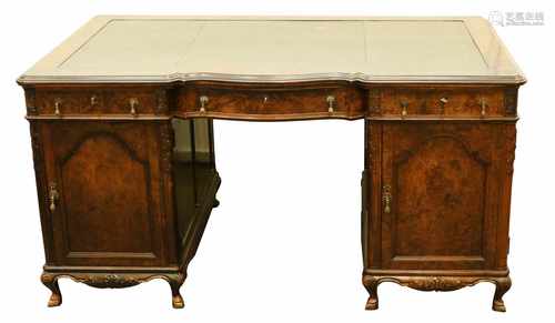 A Queen Ann-style nutwood veneered partnerdesk with leather inlay. Mid 20th century.