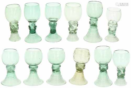 A lot with (12) green 'Roemer'-glasses after earlier example. One with etched vine motif. 20th