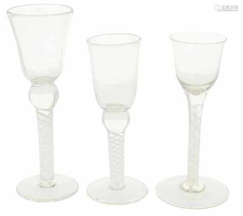 A lot with (3) twisted stem glasses. 19th century.